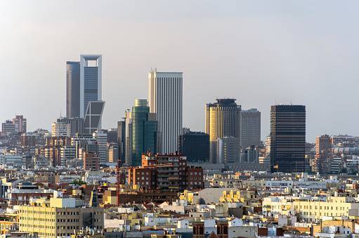 Madrid, view of financial district with the most known modern skyscrapers and office buildings at sunset. cityscape, skyline, landmark